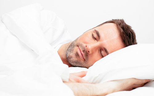 Man on left side sleep position with proper posture